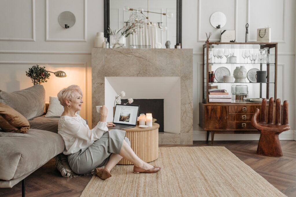 An older woman relaxing in her living room at home in Bayside